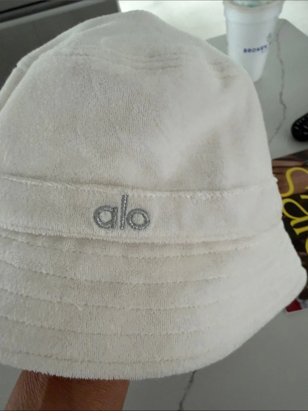 ALO Yoga Cream Plush Bucket Hat with Gray Embroidered Logo